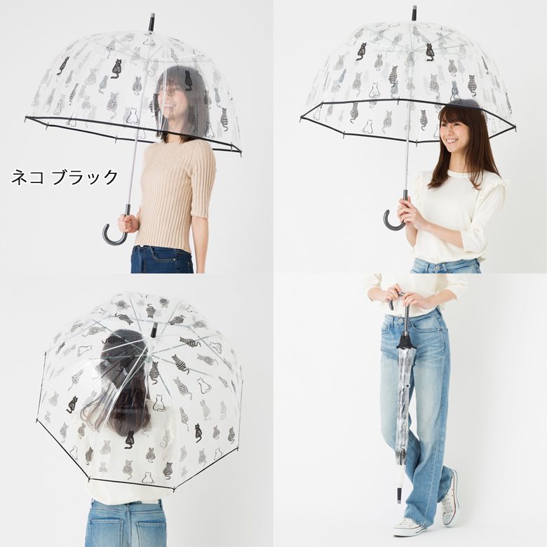 ビニール傘をさす女性モデル横から撮影