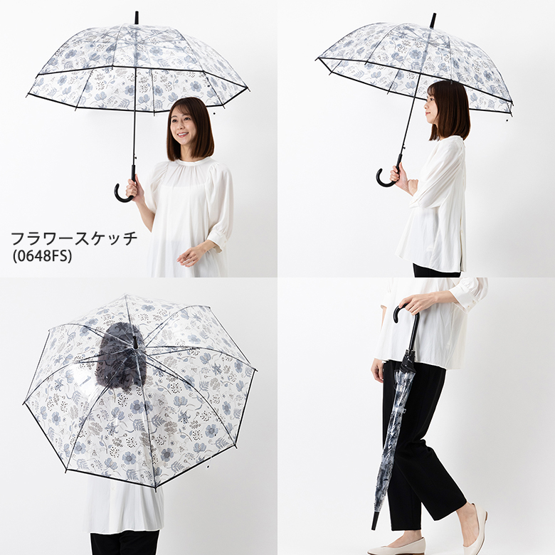 フラワースケッチ柄のビニール傘をさす女性モデル